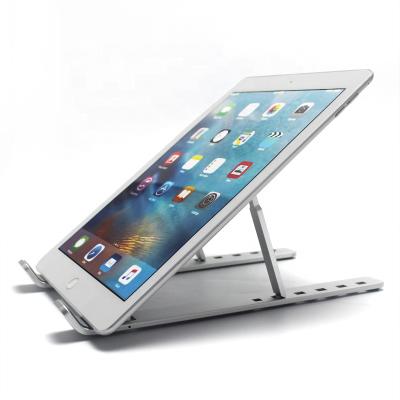 China Portable Universal Metal Mini Notebook PC Holder Stand Cooling Desk Bracket Collapsible Foldable Laptop Stand for sale