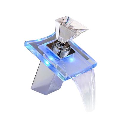 China Electric Faucets Waterfall Luxury Glass Basin Faucet LED Color Changing Bathroom Basin Mixer Tap Battery Operated Chrome Deck Mounted Hot Cold Faucet for sale