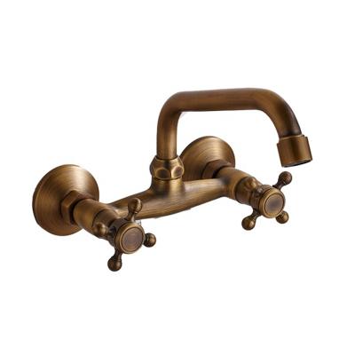 China Wall Mounted Antique Brass Double Handle Kitchen Faucets Bathroom Hot And Cold Water Metered Tap 360 Swivel Long Spout Kitchen Mixer Tap for sale