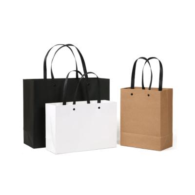 China Recyclable Wholesale Clothing Colorful Kraft Paper White Black Shopping Bag With Plastic Handle for sale