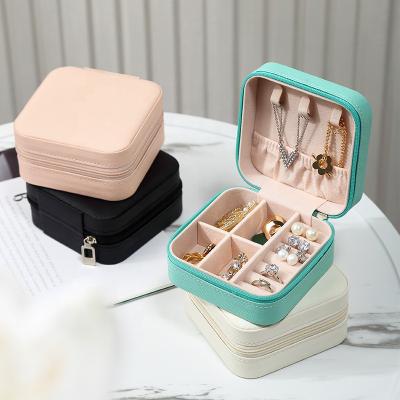 China Customized Logo Leather Travel Jewelry Case, PU Leather Velvet Organizer Small Travel Leather Jewelry Box for sale