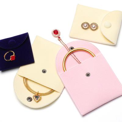 China Mini Necklace Ring Pocket Bag Wholesale Packaging Little Flannel Logo Small Jewelry Gift Bags Custom Made With Button for sale