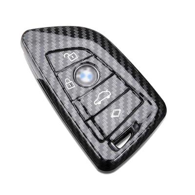 China Carbon Fiber Car Key Cover Protector Carbon Fiber Remote Car Key Case For BMW X1 X2 X3 X4 Series Honda Mazda Factory for sale