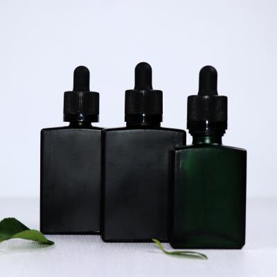 China Rectangle 30ml Rectangle Cosmetic Bottle Glass Rectangle Serum Bottle Dropper Bottles for sale