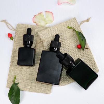 中国 Rectangle Dropper Bottle Essential Oil Bottle 10ml Rectangle Cosmetic Glass Bottle 販売のため