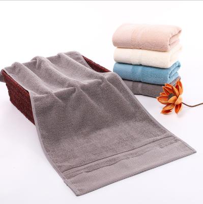 China Wholesale Compressed Thicken White Embroidery Skin Care Luxury 100% Cotton Home Towel for sale