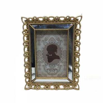 China Modern Luxury Mirror Photo Frame Resin Gold Frame Mirror for sale