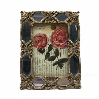 China Luxury Rhinestone Gold Glass Mirror Photo Frame Home Decorative Mirror Framed for sale