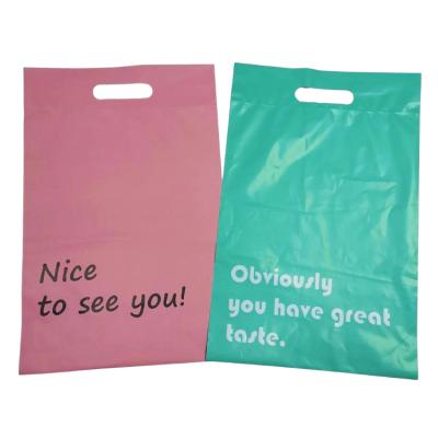 China tearproof/strong/opaque/perfect printing adhesive plastic bag shopping packaging with handle for sale