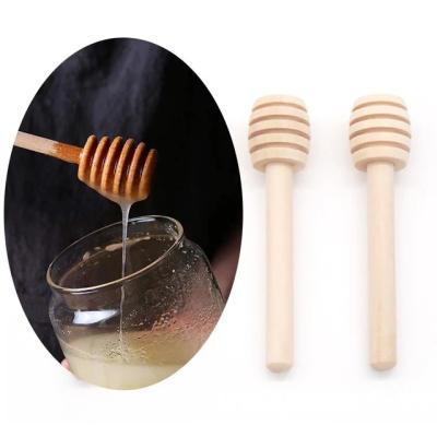 China Bulk Contemporary Customized Engrave LOGO Mini Natural 8cm Honey Dispenser Spoon Fancy Wood Wooden Honey Dipper Stick for sale