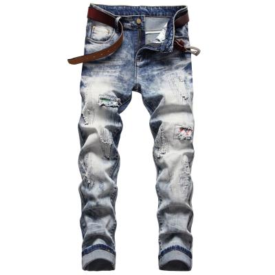 China QUICK DRY nostalgic stretch hole embroidery jeans pants men hot style tapered fashion mens stretch jeans for sale