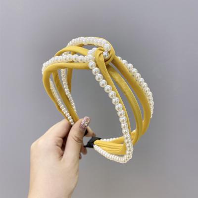 China New high-end fabric design bow fancy cloth hair circle fashion girls cross soft pearl headband headband for sale