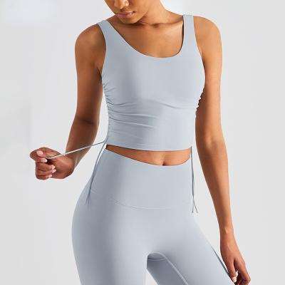 China Nylon Antibacterial Spandex Solid Color Deep Neck Sports Top With Drawstring Moisture Wicking Yoga Bra Sexy Gym Fitness Wear Top for sale