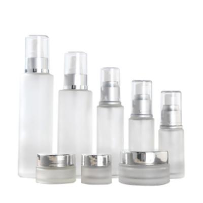 China Luxury Cosmetic Silver Ring Frost Bottles Cosmetic Packaging Container Skin Care Set For Lotion And Cream for sale