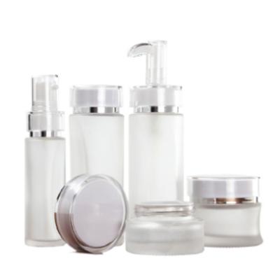 China Wholesale Cosmetic Bottle 30g 50g Skin Care Cream Packaging Emulsion Spray Pump Wholesale Container Frost Glass Bottles Cosmetic Packaging Set for sale