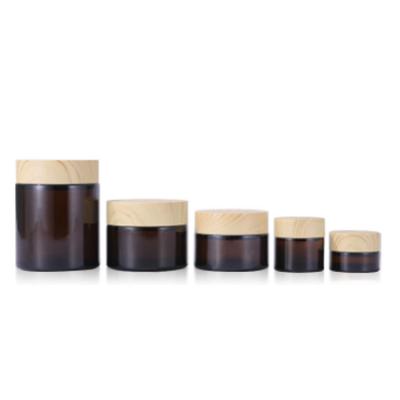 China Factory Wholesale Cosmetic Custom Round Shape Brown Amber Glass Cosmetic Face Eye Cream Jar With Bamboo Lid for sale