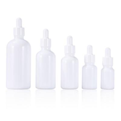 China 10ml 15ml 30ml 50ml 100ml Cosmetic Empty White Porcelain Dropper Glass Bottle for sale