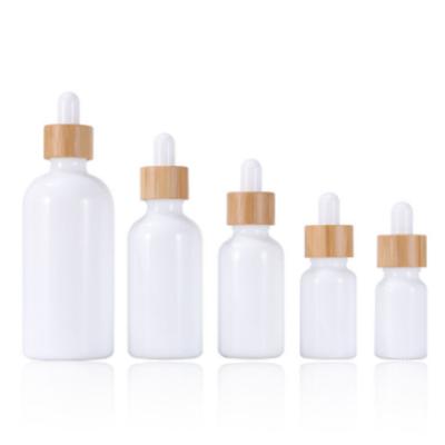 China Jade Cosmetic Bottle White Bamboo Circle Porcelain Bottle White Jade Essential Oil Bottle for sale