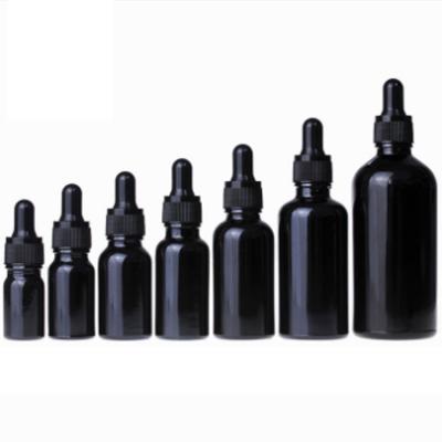 China Wholesale Cosmetic Dropper Bottles 5ml 10ml 15ml 20ml 30ml 50ml 100ml Frosted Black Glass Dropper Bottle for sale