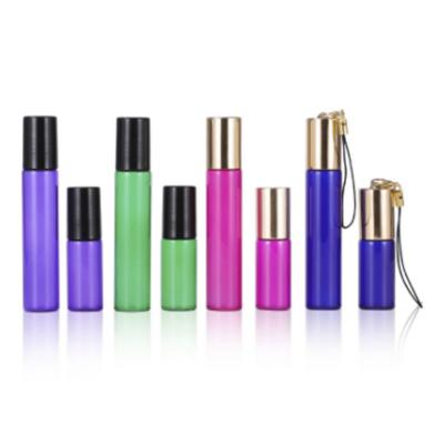 China Roller Cosmetic Bottle With Head Chain 5ml 10ml Blue Purple Green Rose Roller Glass Bottle for sale