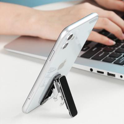 China Newest Small Adjustable Aluminum Portable Foldable Mobile Phone Holder Stand for sale