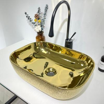 China Art Basin Factory Direct Rectangle Modern Luxurious Gold Hand Ceramic Wash Basin Best Standards for sale