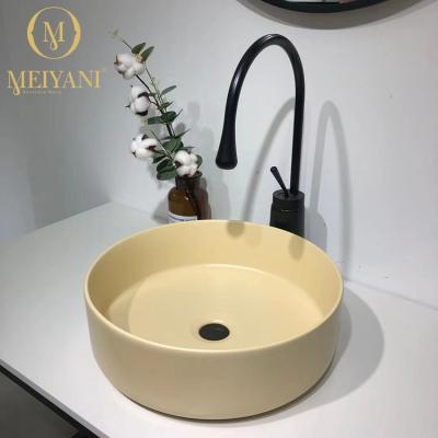 China MEIYANI Matt Color Modern Basin Porcelain Art Basin Bowl Bathroom Hand Sink Small Round Modern Wash Basin for sale