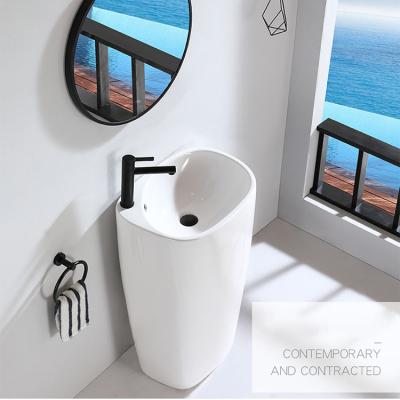 China New Design Pedestal Wash Basin Eco-friendly Modern Irregular Ceramic Freestanding Basin One Piece Basin for sale