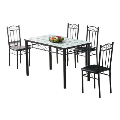 China Sale Modern Simple Tempered Glass Apartment Dining Table Household Small Dining Table Chair Well Placed Set Of Four Dining Tables for sale