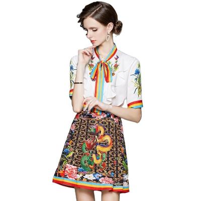 China 2022 New Stain Women's Clothing Wholesale Anti-static Elegant Colorful Striped Shirt Pleated Skirt Set Fashion Print Ruffle Fashion Dress for sale