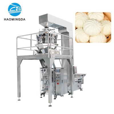 China Food factory direct sale steamed stuffed frozen food dumplings weighing and measuring vertical packaging machine for sale