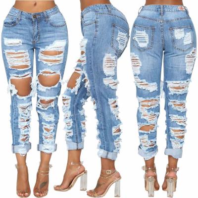 China 2021 new fashion front and back personality hole ladies waterproof girls beggar pants jeans women lattice pants women clothing for sale