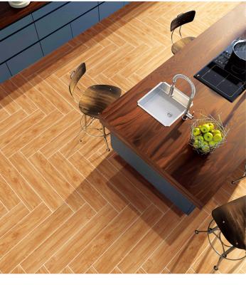 China Rustic Tiles High Quality Wood-Look Porcelain Tile Glazed Non Slip Wood Tiles Porcelain Flooring For Sale for sale