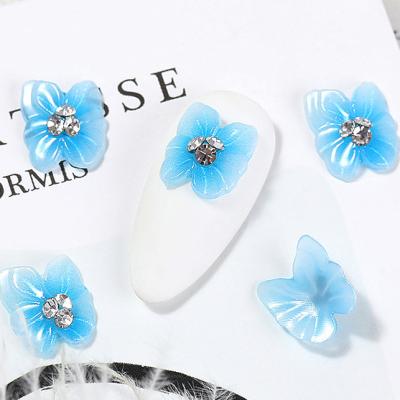 China Excellent Nail Art Ornaments 3D Aurora Crystal Butterfly Nail Art Design Candy Jewelry Decoration Nail Art Effect Wholesale Accept Customized for sale