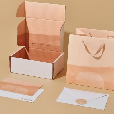 China Recycled Materials Factory Wholesale Custom Express Corrugated Paper Box Recycled Folding Gift Boxes Shipping Tissue Pink Mailing Boxes for sale