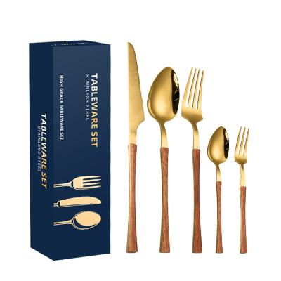 China Hotel Viable Japanese Golden Restaurant Wedding Party Dinnerware Set Creative Stainless Steel Grain Handle Wood Flat Tableware for sale