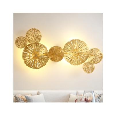 China Modern simple light luxury lotus contemporary Nordic copper leaf living room background wall lamp bedroom bedside for sale