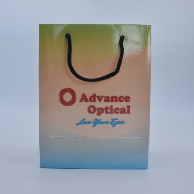 China Recycled Materials Luxury Gift Paper Bag Custom Printed Logo With Hand Length Handle For Glass Case for sale