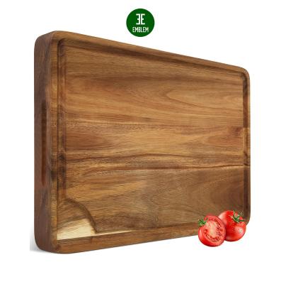 China Viable Large Acacia Wood Cutting Board for the Kitchen with 3 Compartments, Handles and Juice Groove for sale