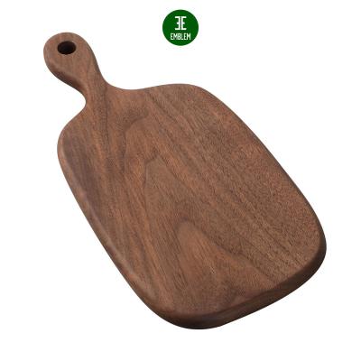 China Small viable wooden cutting board with handle, walnut wood choppers for bread, vegetables and fruits for sale