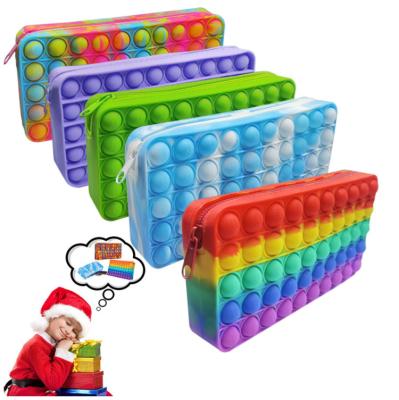 China Gift Pop Bubble Wiggle Toy Colorful Silicone Pencil Case Rubber Bag For Kids Christmas for sale