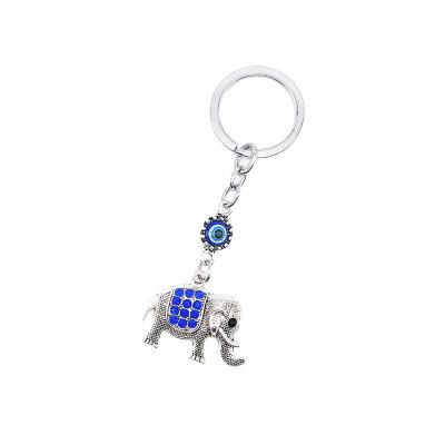 China Bling Bling Crystal Car Pendant Fashion Elephant sound pendant Lucky Amulet Keychain Special Key Demon Blue Eyes Key Chain for sale