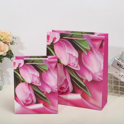 China Recycled Materials mini luxury blue paper art bags packaging custom printed for boutique shopping for Ladies flowers mothers lilies roses tulips for sale