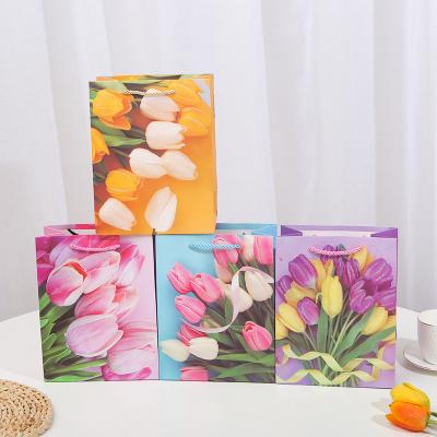 China Recycled Materials hot style competitive price paper bag backpack bag making machine Men cars and women tulip butterflies for making paper for sale