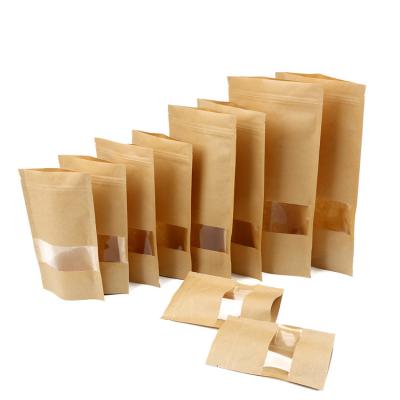 China Custom Doypack Brown Kraft Biodegradable Craft Paper Stand Up Pouches Food Packaging Zipper Bags With Window for sale