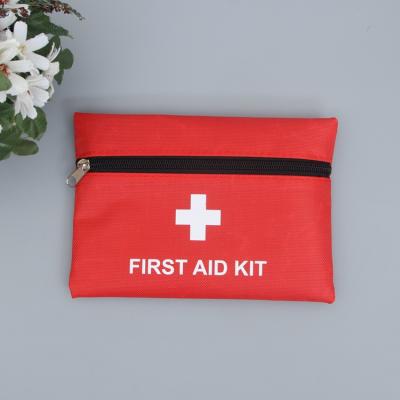 China Emergency / Travel Widely Used Medical Nylon Emergency Bags Red Outdoor First Aid Emergency Kit Bag With Zipper for sale