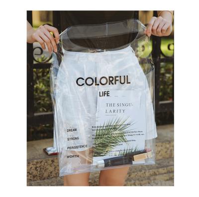 China Fashion Transparent Colored PVC Supermarket Apparel Shopping T-shirt Bag With Logo for sale