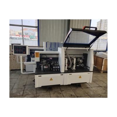 China Factory Wood Working Semi-automatic Edging Machine Gluing Fine Trimming for sale