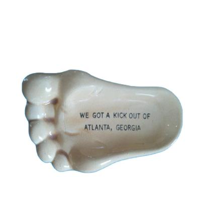 China Wholesale hand made cheap ceramic foot ashtray keepsake with custom logo for sale