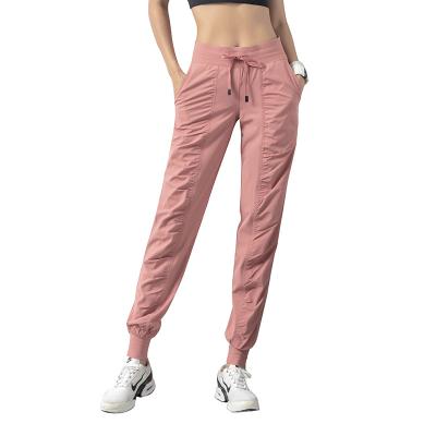 China Breathable Women Joggers Pants With Side Pockets Gaiters Lightweight Sporty Lounge Pants For Workout Yoga Track Sweatpant Cuff Running for sale